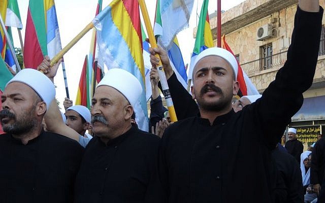 Druze chant at a pro-Syria protest in Majdal Shams on Monday. (Melanie Lidman/Times of Israel) 