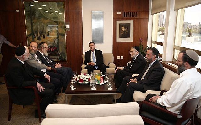 Knesset Speaker Yuli Edelstein meets with a group of Orthodox rabbis at his office following the torching of the Tabgha church, June 25, 2015. (Yuli Edelstein Facebook page) Knesset Speaker Yuli Edelstein meets with a group of Orthodox rabbis at his office following the torching of the Tabgha church, June 25, 2015. (Yuli Edelstein Facebook page)