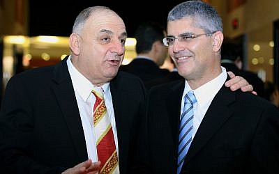 Haim Romano, right, and Yitzhak Tshuva on December 08 2007. (Moshe Shai/FLASH90)