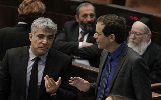 Yesh Atid's Yair Lapid (left) with Zionist Union's Isaac Herzog in the Knesset in 2013. (Photo by Miriam Alster/FLASH90) Yesh Atid's Yair Lapid (left) with Zionist Union's Isaac Herzog in the Knesset in 2013. (Photo by Miriam Alster/FLASH90)