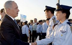 Prime Minister Benjamin Netanyahu seen at a 2013 graduation ceremony for new pilots in the Hatzerim airforce base near the southern Israeli town of Beersheba. (Photo by Haim Zach/GPO/FLASH90)