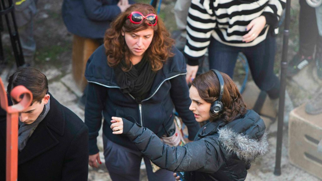 Natalie Portman, lower right, directing her adaptation of Amos Oz's autobiographical novel, 'A Tale of Love and Darkness,' on the streets of Jerusalem last year (Yonatan Sindel/Flash 90) Natalie Portman, lower right, directing her adaptation of Amos Oz's autobiographical novel, 'A Tale of Love and Darkness,' on the streets of Jerusalem last year (Yonatan Sindel/Flash 90)