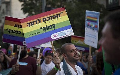 People marching at a gay pride parade in Jerusalem on September 18, 2014. (Hadas Parush/Flash90)