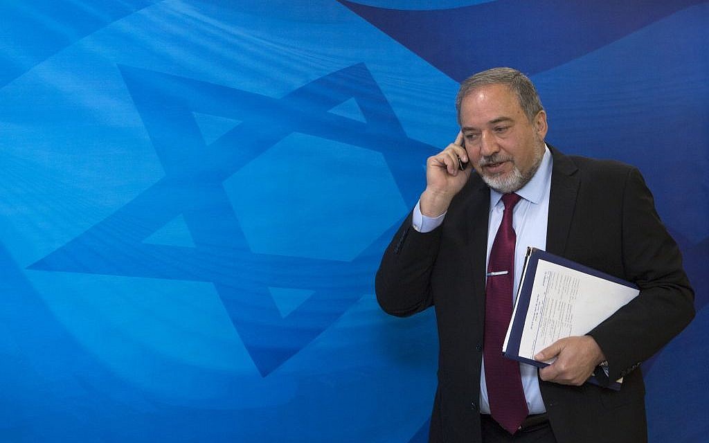 Then foreign minister Avigdor Liberman arrives for a cabinet meeting, at the PM's office in Jerusalem, on April 19, 2015. (Photo by Olivier Fitoussi/POOL)