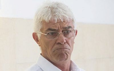 Yair Biton, connected to the court case on Israeli attorney Ronel Fisher (not seen) arrives to the District court in Jerusalem on June 10, 2015.  (Photo by Miriam Alster/Flash90)