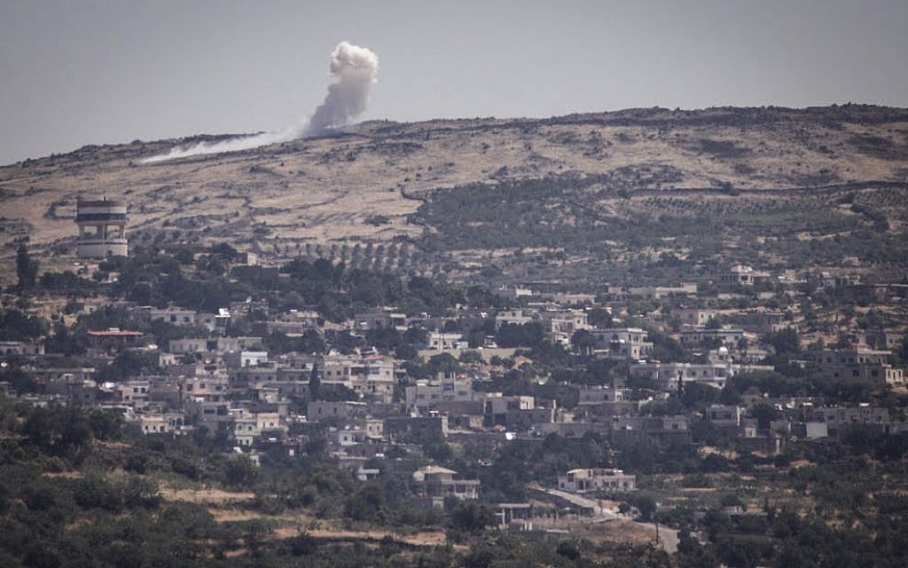 View of bombing between Syrian forces from the Israeli side of the border with Syria in the Golan Heights due, on June 16, 2015. (Basel Awidat/Flash90) View of bombing between Syrian forces from the Israeli side of the border with Syria in the Golan Heights due, on June 16, 2015. (Basel Awidat/Flash90)
