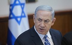 Prime Minister Benjamin Netanyahu speaks at the weekly cabinet meeting in Jerusalem, on June 21, 2015. (Alex Kolomoisky/POOL)