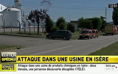 Emergency services outside a factory where a man was beheaded in a terrorist attack, in Saint-Quentin-Fallavier, France, Friday, June 26, 2015. (I Tele via AP)