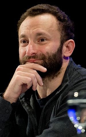 In this March 6 , 2014 file picture, Russian music director of the Bavarian State Opera, Kirill Petrenko, speaks during the annual press conference at the State Opera in Munich, Germany. Petrenko will take over the Berlin Philharmonic from Sir Simon Rattle, who is leaving to take over the London Symphony Orchestra. (Sven Hoppe/dpa via AP,file)