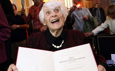 Ingeborg Syllm-Rapoport holds up her doctoral certificate during a ceremony at the University Clinic Hamburg-Eppendorf in Hamburg, Germany, June 9, 2015. (Bodo Marks/dpa via AP)