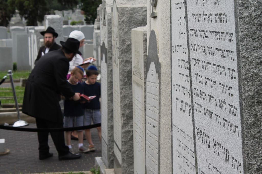 Chabad families often make the pilgrimage to the 'Ohel,' the New York grave of Rebbe Menachem Mendel Schneerson, to celebrate lifecycle events. (Hannah Dreyfus/The Times of Israel) Chabad families often make the pilgrimage to the 'Ohel,' the New York grave of Rebbe Menachem Mendel Schneerson, to celebrate lifecycle events. (Hannah Dreyfus/The Times of Israel)