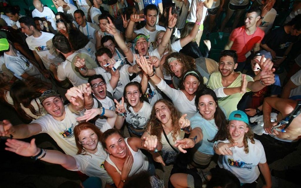 Participants celebrate Taglit-Birthright Israel's 15th anniversary, Tel Aviv, June 2015. (Courtesy) Participants celebrate Taglit-Birthright Israel's 15th anniversary, Tel Aviv, June 2015. (Courtesy)