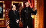 Jason Alexander, left, and Larry David speak onstage during the 2015 Tony Awards at Radio City Music Hall on June 7, 2015 in New York City.  (Photo by Theo Wargo/Getty Images for Tony Awards Productions/JTA)