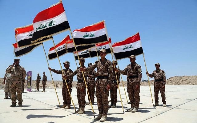 Sunni tribal volunteers with national flags stand in formation during their graduation ceremony in Habaniyah, 80 kilometers (50 miles) west of Baghdad, Iraq, Wednesday, June 17, 2015 (AP Photo/ Khalid Mohammed) Sunni tribal volunteers with national flags stand in formation during their graduation ceremony in Habaniyah, 80 kilometers (50 miles) west of Baghdad, Iraq, Wednesday, June 17, 2015 (AP Photo/ Khalid Mohammed)