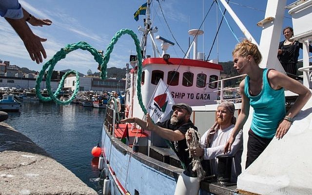 Crew members aboard the Marianne ship, one of four ships attempting to breach a naval blockade of Gaza, carrying about 20 activists, including Israeli Arab lawmaker Basel Ghattas and former Tunisian President Moncef Marzouki. (Pablo Miranzo , Ship to Gaza-Sweden, via AP) Crew members aboard the Marianne ship, one of four ships attempting to breach a naval blockade of Gaza, carrying about 20 activists, including Israeli Arab lawmaker Basel Ghattas and former Tunisian President Moncef Marzouki. (Pablo Miranzo , Ship to Gaza-Sweden, via AP)