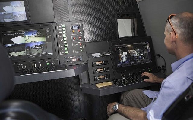 A representative of an Israeli company demonstrates a mobile command and control station hidden in a truck during an expo of Israeli intelligence-gathering technology in Tel Aviv, Israel, Tuesday, June 30, 2015. (AP Photo/Dan Balilty) A representative of an Israeli company demonstrates a mobile command and control station hidden in a truck during an expo of Israeli intelligence-gathering technology in Tel Aviv, Israel, Tuesday, June 30, 2015. (AP Photo/Dan Balilty)