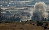 Smoke and explosions from fighting between forces loyal to Syrian President Bashar Assad and rebels, in the Quneitra area, seen from the Golan Heights, June 17, 2015. (AP/Ariel Schalit/ File)