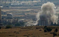 Smoke and explosions from fighting between forces loyal to Syrian President Bashar Assad and rebels, in the Quneitra area, seen from the Golan Heights, June 17, 2015. (AP/Ariel Schalit/ File)