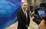 In this Jan. 18, 2015, file photo, Naftali Bennett speaks with the media ahead of a weekly cabinet meeting in Jerusalem. (Abir Sultan, Pool Photo via AP, File)