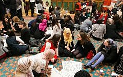 Muslim and Jewish participants in an interfaith initiative at the Jewish Museum in the London Borough of Camden, June 9, 2015 (Yakir Zur/via JTA)