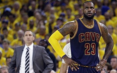 Illustrative: Cleveland Cavaliers forward LeBron James (23) stands on the court in front of head coach David Blatt during the first half of Game 2 of basketball's NBA Finals against the Golden State Warriors in Oakland, California, June 7, 2015. (AP/Ben Margot)