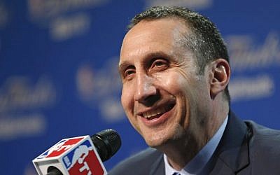 Then-Cleveland Cavaliers head coach David Blatt, laughs at a question during a press conference following Game 3 of basketball's NBA Finals against the Golden State Warriors in Cleveland, Wednesday, June 10, 2015.  (AP Photo/Paul Sancya)
