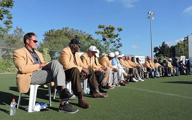 Pro Football Hall of Famers on a tour of Israel organized by New England Patriots owner Robert Kraft watch a scrimmage at Kraft's Jerusalem stadium on June 21, 2015. (Ben Sales/JTA) Pro Football Hall of Famers on a tour of Israel organized by New England Patriots owner Robert Kraft watch a scrimmage at Kraft's Jerusalem stadium on June 21, 2015. (Ben Sales/JTA)