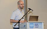 Ofir Leitner speaks at the Israel Mobile Summit (Courtesy)