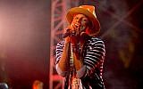 Pharrell Williams, park ranger hat firmly in place, performing at a recent Coachella Valley Music festival (Courtesy Shawn Ahmed/CC BY 2.0)
