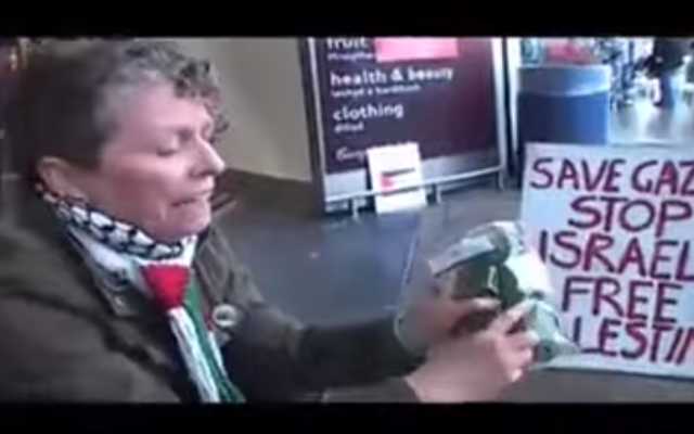 Protest against Israeli products at a British Tesco supermarket, July 2014. (screen capture: YouTube/Kashif Raza)