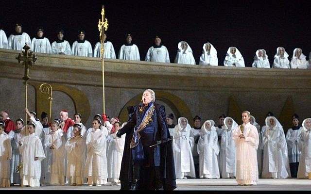 One of the only chorus scenes in La Tosca. Some of the religiously observant members of the Israel Opera opted to wear necklaces with "T"s instead crosses, for religious reasons. (courtesy Israel Opera/Yossi Zwecker)