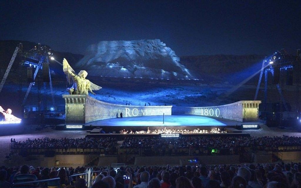 The performance of La Tosca at Masada barely utilized the mountain, only lighting it at a few points. The enormous stage swallowed performers when there were only two or three during most of the show. (courtesy Israel Opera/Yossi Zwecker) The performance of La Tosca at Masada barely utilized the mountain, only lighting it at a few points. The enormous stage swallowed performers when there were only two or three during most of the show. (courtesy Israel Opera/Yossi Zwecker)