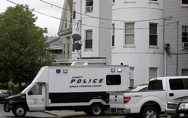 Police vehicles sit in front of a multi-storied home in Everett, Mass being searched by authorities in connection with a man shot and killed earlier in the day in Boston, June 2, 2015. (AP/Steven Senne) Police vehicles sit in front of a multi-storied home in Everett, Mass being searched by authorities in connection with a man shot and killed earlier in the day in Boston, June 2, 2015. (AP/Steven Senne)