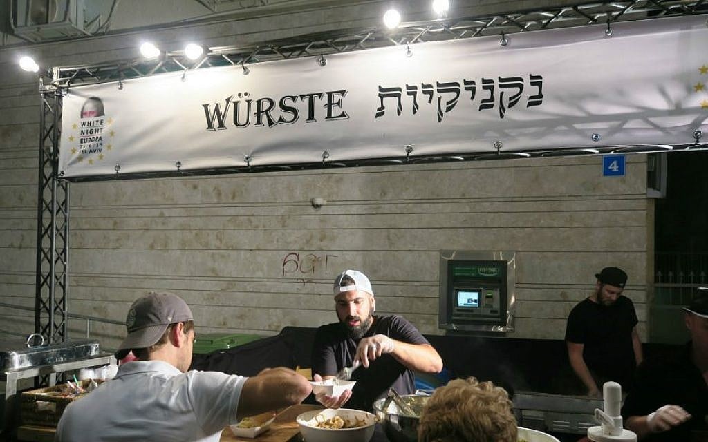 Serving up some wurste at White Night (Courtesy Brandon Berry)