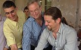 (L to R) Shlomo Touboul, Eric Schmidt, and Ofer Israeli cut the cake celebrating the official launch of Illusive in Tel Aviv, June 8, 2015 (Illusive Networks)