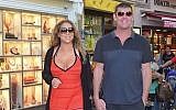 Singer Mariah Carey strolls hand-in-hand with her significant other, Australian businessman James Packer, in Capri, Italy, in June 2015. (Screen capture: YouTube)