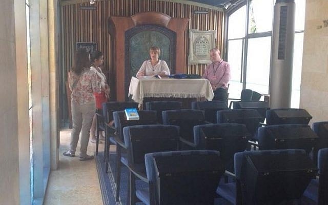 A photo from a May 26 planning meeting in the synagogue of the President’s Residence, where a bar mitzvah ceremony for disabled children was to take place.  Left-to-right are Marianela Kreiman, coordinator of Masorti’s bar/bat mitzvah program; a staffer from the Ministry for Diaspora Affairs; a member of the President's Residence staff; and Yizhar Hess, CEO of the Masorti movement in Israel.  (Photo by Ronen Ber-Avrahm.)