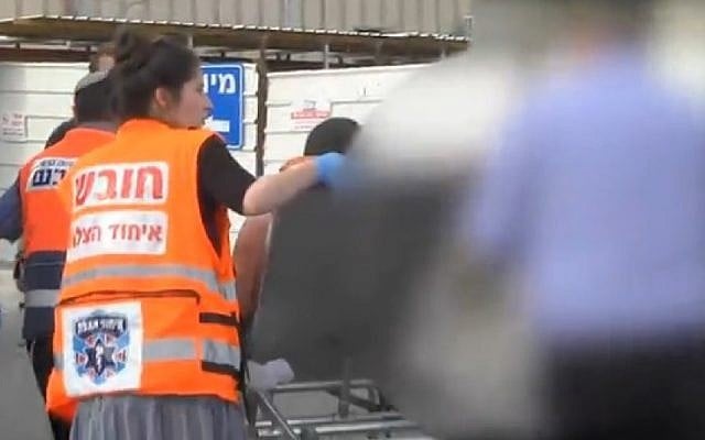 Screenshot from a video showing the evacuation to hospital of an Israeli man injured in a West Bank shooting attack in which another man was killed, June 19, 2015. (Screenshot/Ynet) Screenshot from a video showing the evacuation to hospital of an Israeli man injured in a West Bank shooting attack in which another man was killed, June 19, 2015. (Screenshot/Ynet)