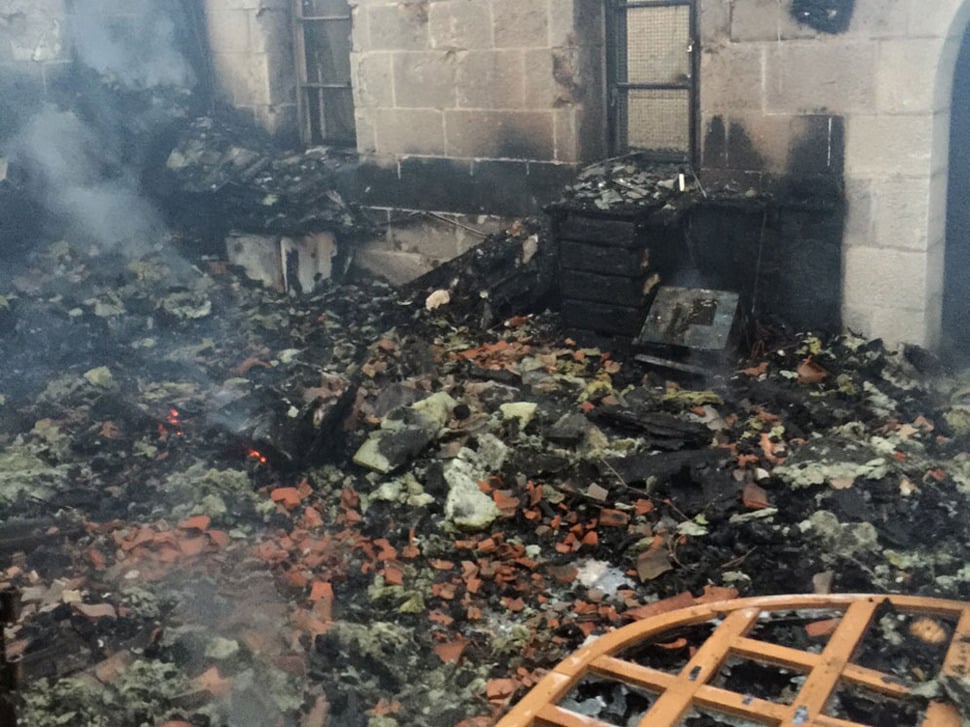 The aftermath of a suspected arson attack at the Church of the Multiplication on the Sea of Galilee on Thursday, June 18, 2015 (Fire and Rescue Services) The aftermath of a suspected arson attack at the Church of the Multiplication on the Sea of Galilee on Thursday, June 18, 2015 (Fire and Rescue Services)
