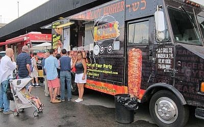 Thirty kosher food trucks and restaurants served up everything from falafel and shawarma to salads and cheese at the Celebrate Israel Parade in New Yorl, May 31, 2015. (Cathryn J. Prince)