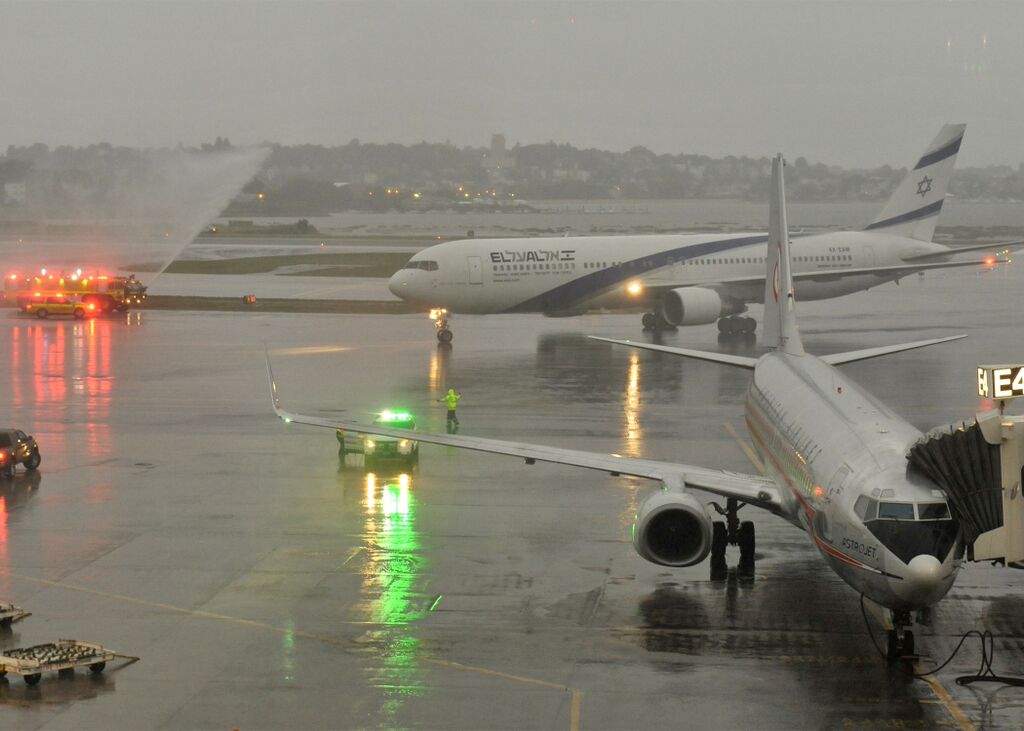 In a time-honored ceremony, El Al's new Boston-TLV nonstop flight route was inaugurated at Boston's Logan International Airport with a symbolic hosing of the route's first airplane, on June 28, 2015 (photo credit: Alan Dines/Massport) In a time-honored ceremony, El Al's new Boston-TLV nonstop flight route was inaugurated at Boston's Logan International Airport with a symbolic hosing of the route's first airplane, on June 28, 2015 (photo credit: Alan Dines/Massport)