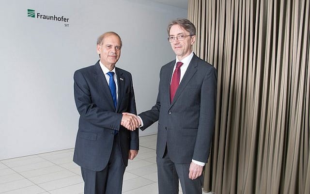 Israeli Ambassador to Germany Yakov Hadas-Handelsman (left) with Fraunhofer SIT's CEO Prof. Dr. Michael Waidner (Courtesy) Israeli Ambassador to Germany Yakov Hadas-Handelsman (left) with Fraunhofer SIT's CEO Prof. Dr. Michael Waidner (Courtesy)