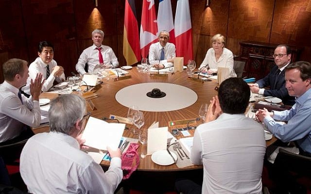 (Clockwise, from center) US President Barack Obama, Germany's Chancellor Angela Merkel, French President Francois Hollande, British Prime Minister David Cameron, Italy's Prime Minister Matteo Renzi, European Commission President Jean-Claude Juncker, European Council President Donald Tusk, Japan's Prime Minister Shinzo Abe and Canada's Prime Minister Stephen Harper attend a working dinner at a G7 summit at the Elmau Castle near Garmisch-Partenkirchen, southern Germany, on June 7, 2015 (AFP/POOL/STEPHEN CROWLEY) (Clockwise, from center) US President Barack Obama, Germany's Chancellor Angela Merkel, French President Francois Hollande, British Prime Minister David Cameron, Italy's Prime Minister Matteo Renzi, European Commission President Jean-Claude Juncker, European Council President Donald Tusk, Japan's Prime Minister Shinzo Abe and Canada's Prime Minister Stephen Harper attend a working dinner at a G7 summit at the Elmau Castle near Garmisch-Partenkirchen, southern Germany, on June 7, 2015 (AFP/POOL/STEPHEN CROWLEY)