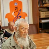 Local men and woman listen to a course on the Jewish holiday of Shavuot at the Jewish Community Center of Zaporozhye, May 20, 2015. (photo credit: Anna Moskalkova/WJR)