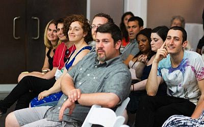 Bar mitzvah-themed storytelling events such as Rebar in Brooklyn seek to prompt reflection on the ritual. (Emmanuel Abreu/via JTA)