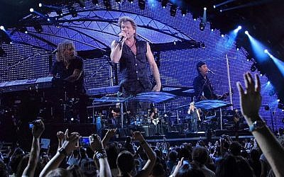 (The rock band Bon Jovi performing live at the Olympic stadium during the 2011 open air tour in Athens, July 20th 2011.  via Shutterstock)