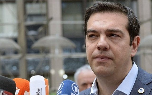 Greek Prime Minister Alexis Tsipras talks to the media as he arrives for a meeting of the leaders of the 19 countries that use the euro, in Brussels on July 12, 2015. (AFP / THIERRY CHARLIER) Greek Prime Minister Alexis Tsipras talks to the media as he arrives for a meeting of the leaders of the 19 countries that use the euro, in Brussels on July 12, 2015. (AFP / THIERRY CHARLIER)