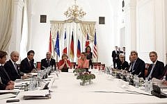 German Minister for Foreign Affairs Frank-Walter Steinmeier (L) ,French Foreign Minister Laurent Fabius (3rd L), China's Foreign Minister Wang Yi (5th L), Federica Mogherini (C), High Representative of the European Union for Foreign Affairs and Security Policy, US Secretary of State John Kerry (3rd R), British Foreign Secretary Philip Hammond (2nd R) and Russian Foreign Minister Sergey Lavrov (R) sit around the table at the Palais Coburg Hotel where the Iran nuclear talks meetings are being held in Vienna, Austria on July 6, 2015 .(AFP PHOTO / POOL / CARLOS BARRIA)