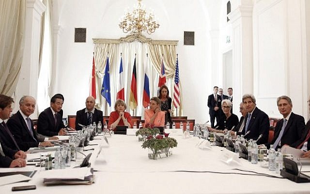 German Minister for Foreign Affairs Frank-Walter Steinmeier (L) ,French Foreign Minister Laurent Fabius (3rd L), China's Foreign Minister Wang Yi (5th L), Federica Mogherini (C), High Representative of the European Union for Foreign Affairs and Security Policy, US Secretary of State John Kerry (3rd R), British Foreign Secretary Philip Hammond (2nd R) and Russian Foreign Minister Sergey Lavrov (R) sit around the table at the Palais Coburg Hotel where the Iran nuclear talks meetings are being held in Vienna, Austria on July 6, 2015 .(AFP PHOTO / POOL / CARLOS BARRIA) German Minister for Foreign Affairs Frank-Walter Steinmeier (L) ,French Foreign Minister Laurent Fabius (3rd L), China's Foreign Minister Wang Yi (5th L), Federica Mogherini (C), High Representative of the European Union for Foreign Affairs and Security Policy, US Secretary of State John Kerry (3rd R), British Foreign Secretary Philip Hammond (2nd R) and Russian Foreign Minister Sergey Lavrov (R) sit around the table at the Palais Coburg Hotel where the Iran nuclear talks meetings are being held in Vienna, Austria on July 6, 2015 .(AFP PHOTO / POOL / CARLOS BARRIA)