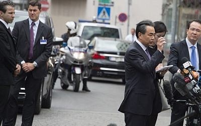 China's Foreign Minister Wang Yi speaks to journalists as he arrives at the Palais Coburg Hotel where the Iran nuclear talks meetings are being held in Vienna, Austria on July 6, 2015. (Joe Klamar/AFP)